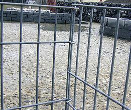 closeup shot of a metal cage by GABION SUPPLY