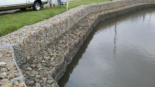 GABION SUPPLY Curved Wall for a lake