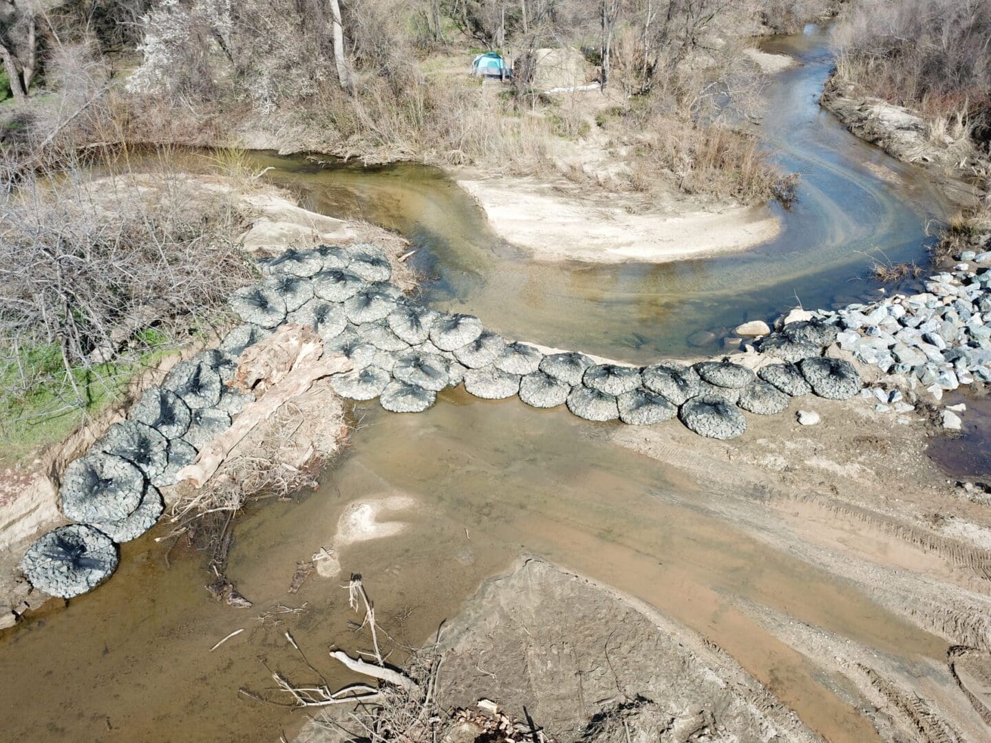 A river with many tires in it